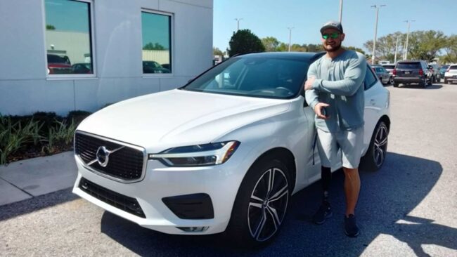 U.S. Army Specialist Stephen Peterson with 2023 Volvo XC60 Sport Utility.
