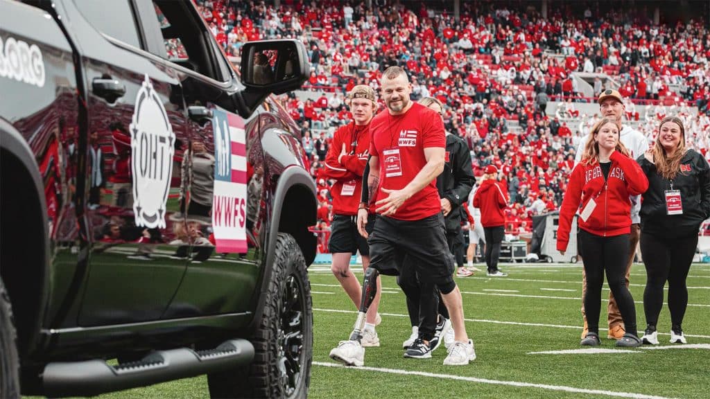 Army Sgt. Ben Markmeier presented New Truck at Husker Football Game
