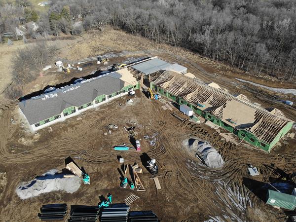 Aerial construction progress photo of Dunham House